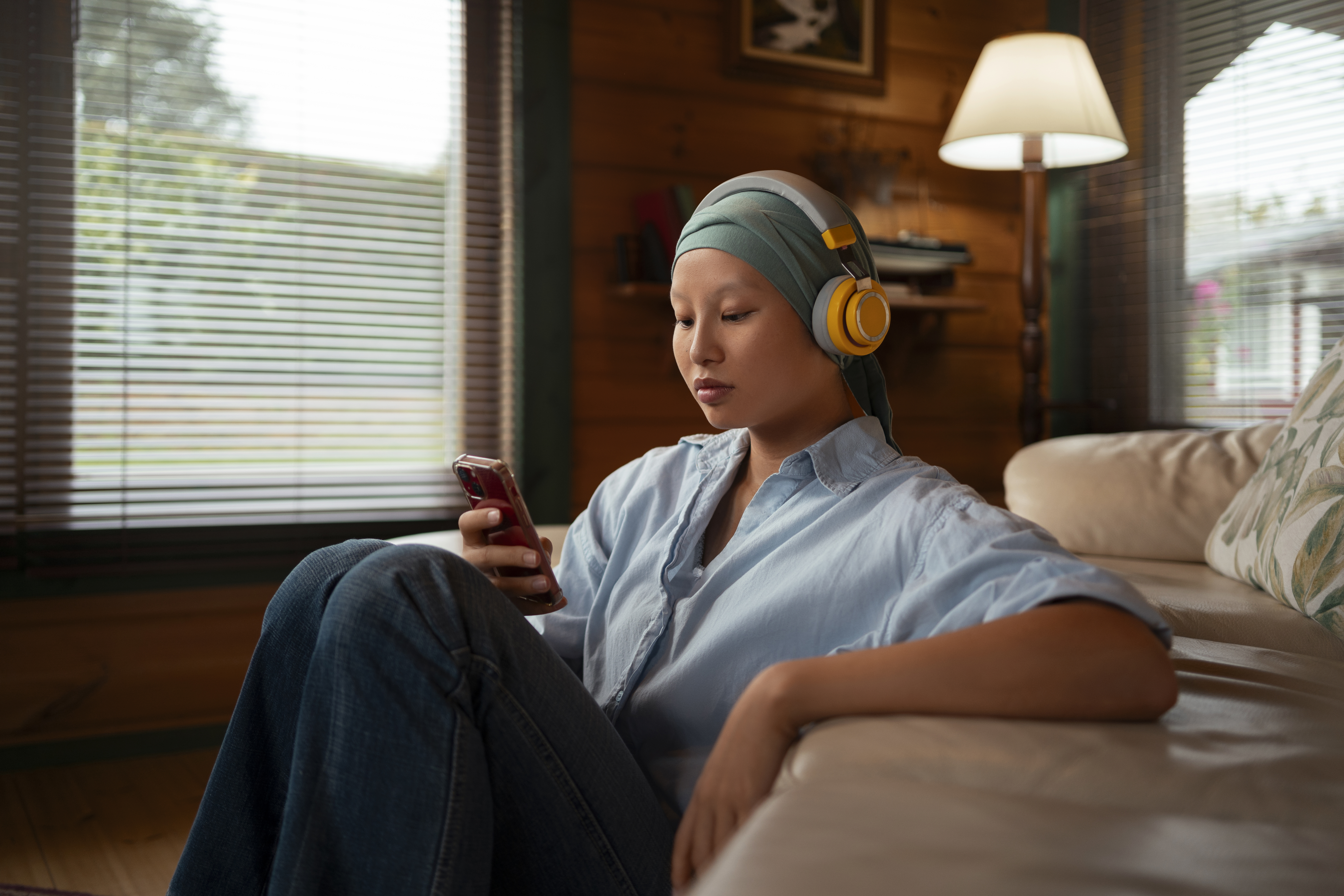 women with cancer listening music at home